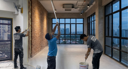 HDB house painting service executing flawless ceiling painting inside a modern Singapore apartment